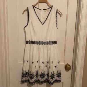 White cotton voile dress with navy embroidery